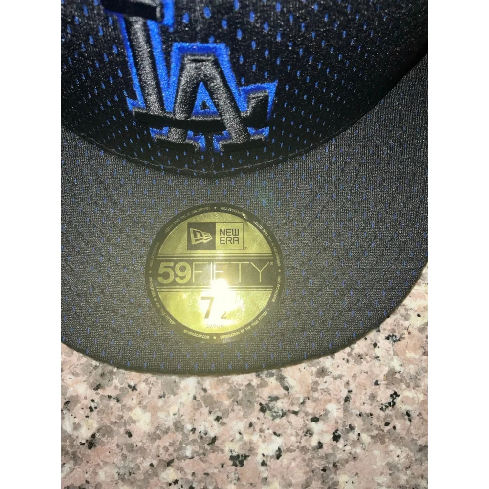 Los Angeles Dodgers 5 fitted cap and a blue and grey beanie